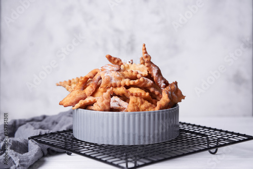 Photography Brushwood - russian traditional cookies with powdered sugar