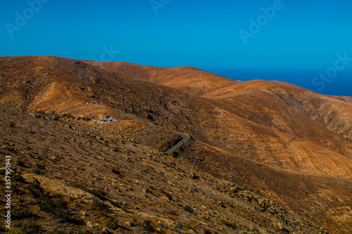 Landscape of Panoramic vulcanic mountains and Atlantic Ocean , dunes of coralejo and Gran Tarajal Port in Fuerteventura, Lanzarote 