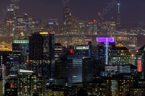 Oakland and San Francisco Skylines via Oakland Hills  © Yuval Helfman