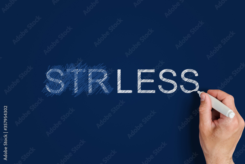 no stress concept. male hand crosses out the inscription stress and writes the inscription less stress no stress concept. male hand crosses out the inscription stress and writes the inscription less stress