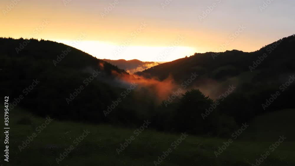 amazing panorama of fog in valley at sunset amazing panorama of fog in valley at sunset