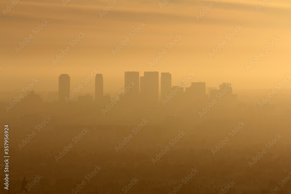 Smoggy foggy afternoon view of Century City and west Los Angeles in Southern California.