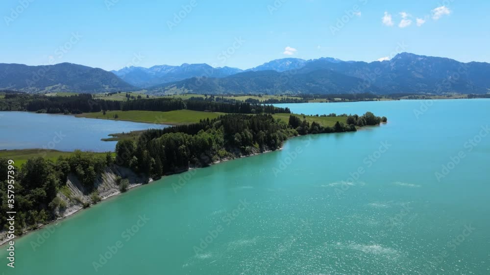 Aerial view over Lake Forggensee at the city of Fuessen in Bavaria Germany Aerial view over Lake Forggensee at the city of Fuessen in Bavaria Germany