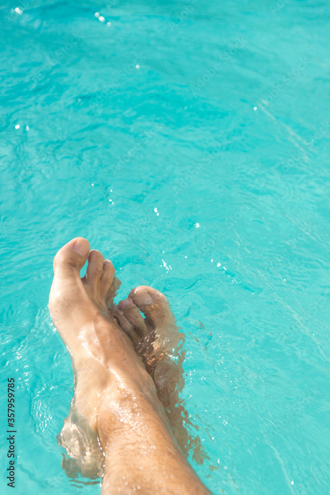 feet in the pool water