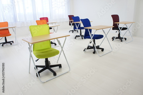 desks and chairs in the room