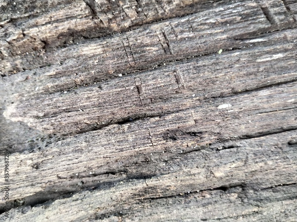 wood surface that is old with brown and black colors wood surface that is old with brown and black colors