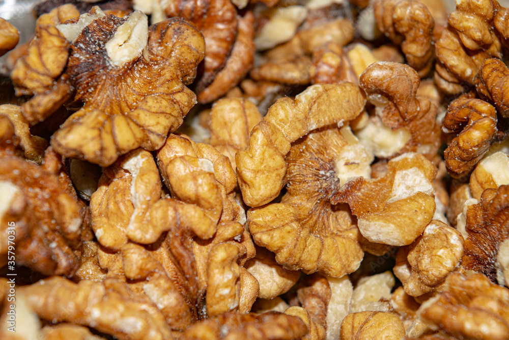 Peeled walnuts close-up. Surface texture. Healthy diet. Peeled walnuts close-up. Surface texture. Healthy diet.