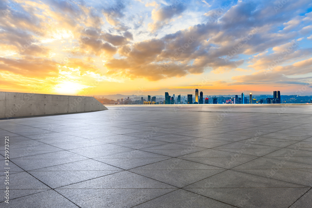 Empty square floor and chongqing skyline with buildings at sunset,China.High angle view.