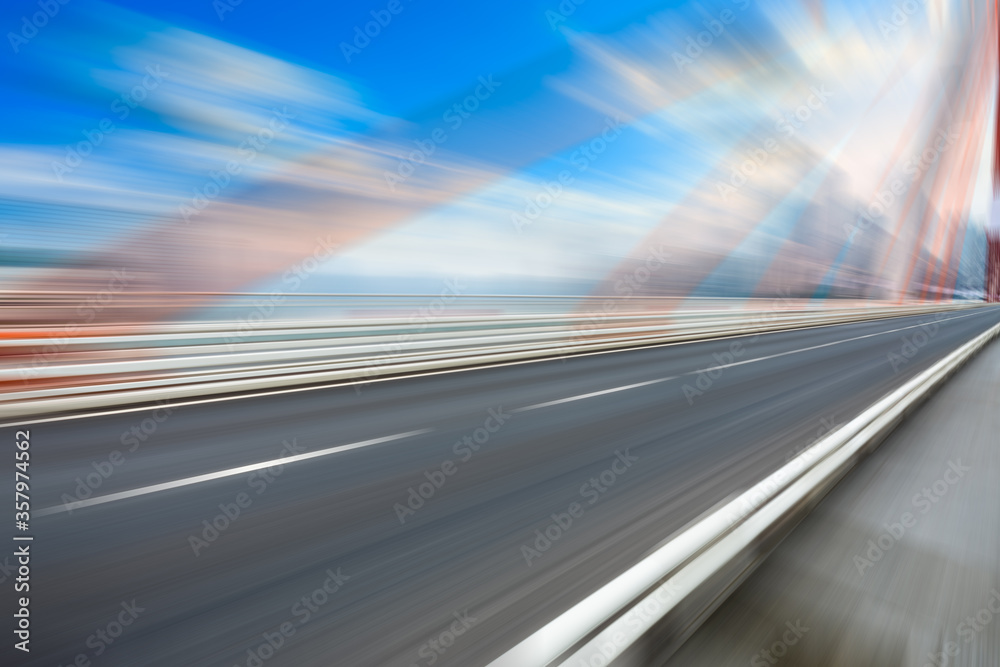 Fast moving asphalt road and bridge background.