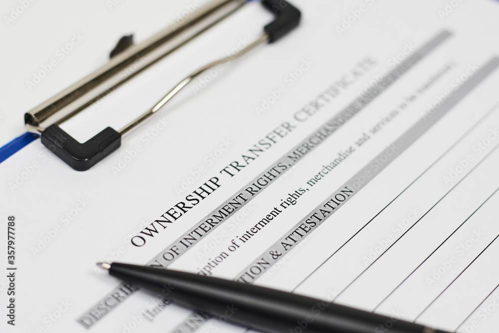 Close-up view of Ownership transfer certificate document Close-up view of Ownership transfer certificate document