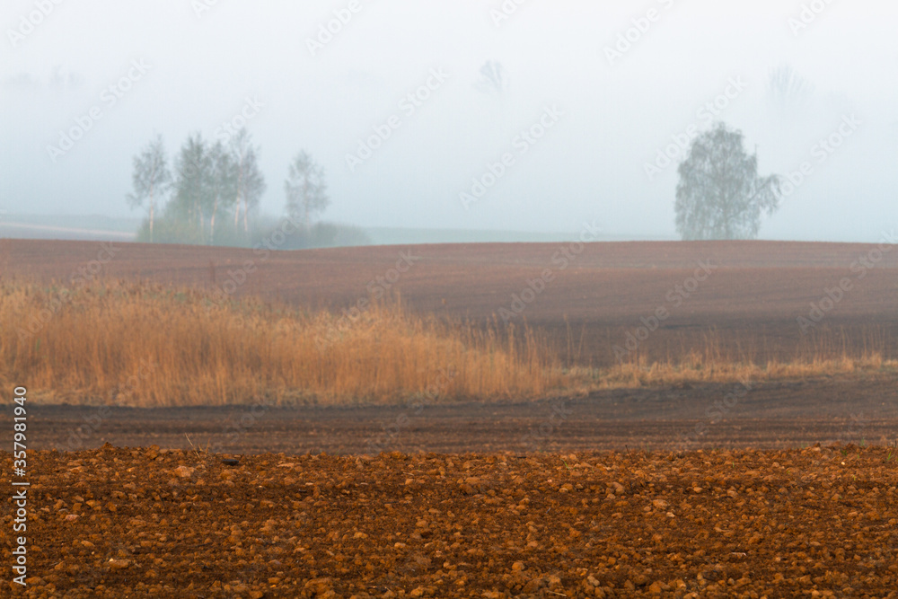 Cultivated land in early spring Cultivated land in early spring