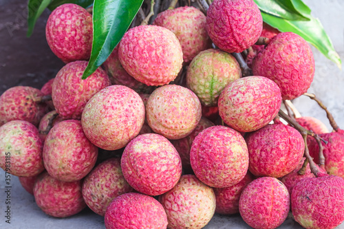 Close up fresh red ripe lychee or litchi chinensis tropical fruits