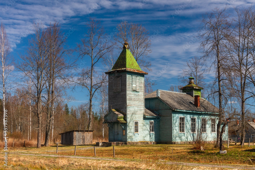 Fototapeta premium old wooden church in blue color