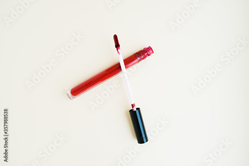 liquid lipstick in a tube on a light background