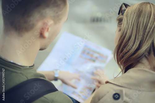 tourists in the city with a map, trip travel city map tourism