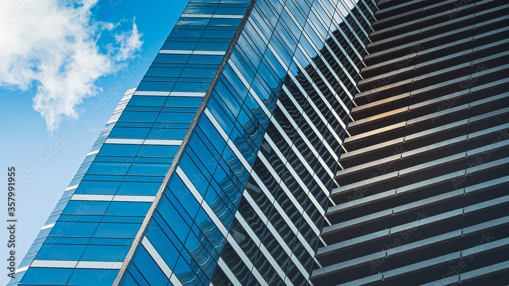Fototapeta premium Detailed texture of windows and blue sky for financial or corporate purpose.