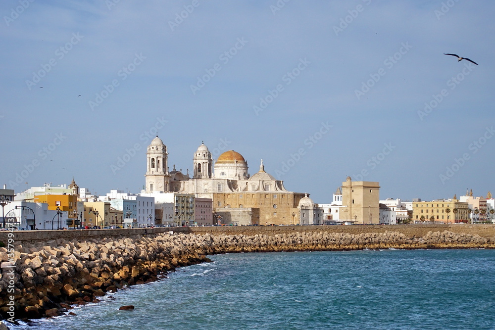 Paseo Campo del Sur Promenade with The Cadiz Cathedral called Santa Cruz or Catedral Nueva (New Cathedral) in the background 