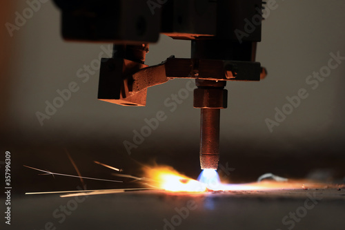 Cnc oxy - fuel cutting machine. Typical materials cut with a plasma torch include steel. photo
