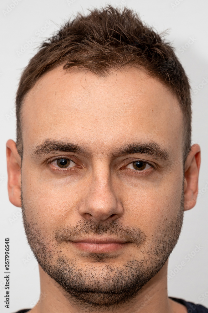 face of a handsome man with a new haircut