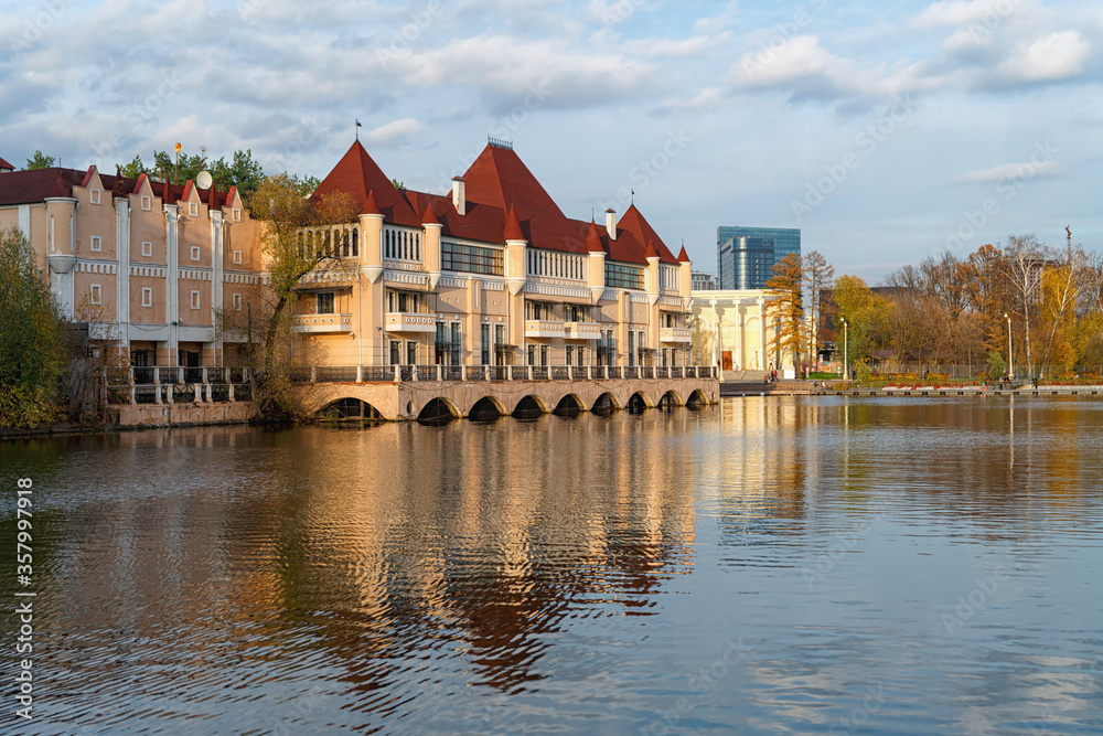 Russia, Moscow, October 2020. A modern replica of a French mansion on the lake.