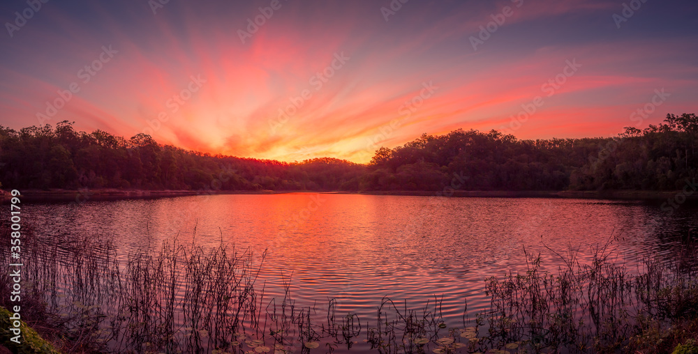 Beautiful Panoramic Lakeside Sunset with Reflections