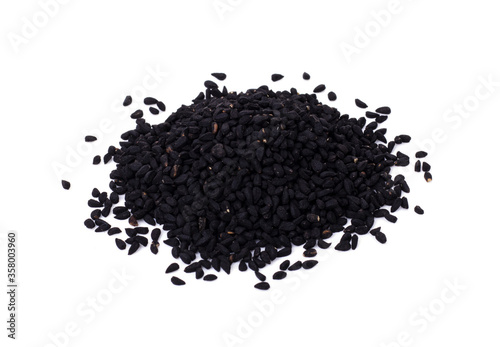 black cumin seeds isolated on a white background