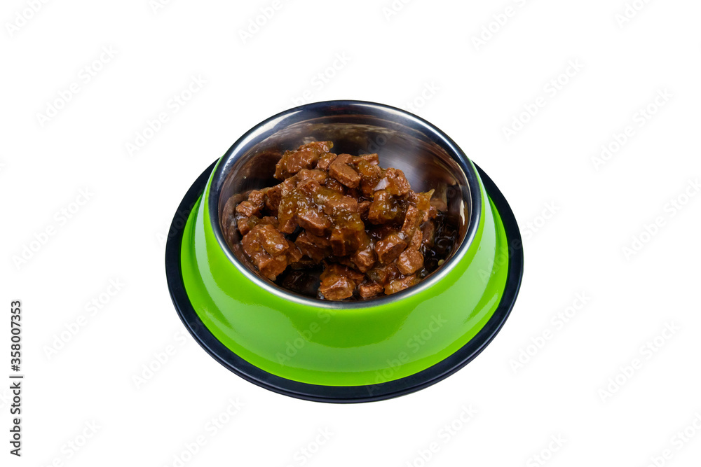 Canned food for cats or dogs in metal green bowl isolated on white background Canned food for cats or dogs in metal green bowl isolated on white background