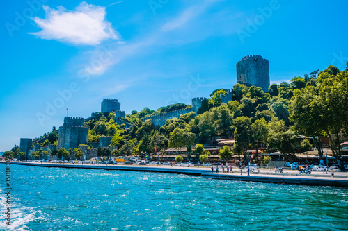 Beautiful scenery port in Istanbul background. Resort town side in Bosphorus Bridge, Turkey.