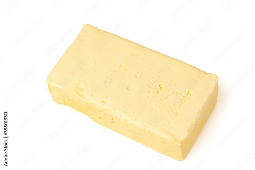 Block of butter isolated on white background