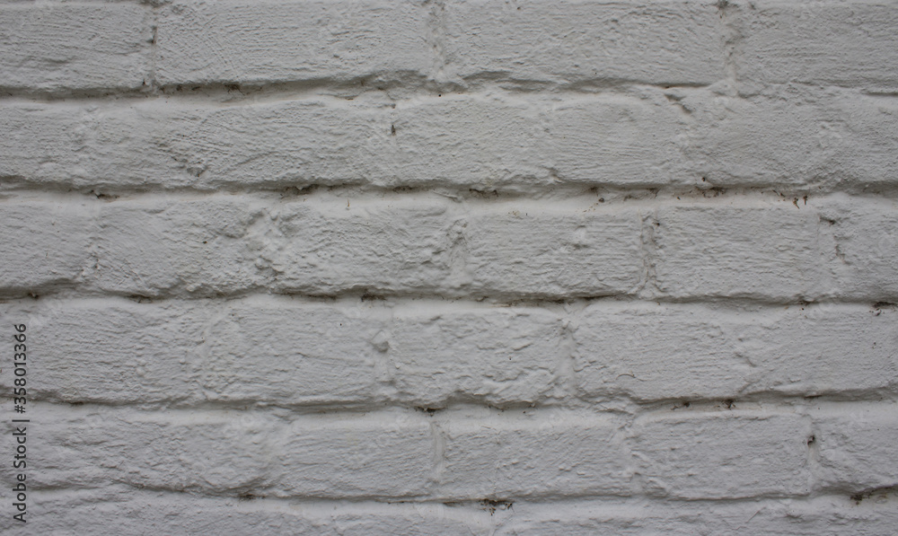 Texture of a brick wall painted white Texture of a brick wall painted white