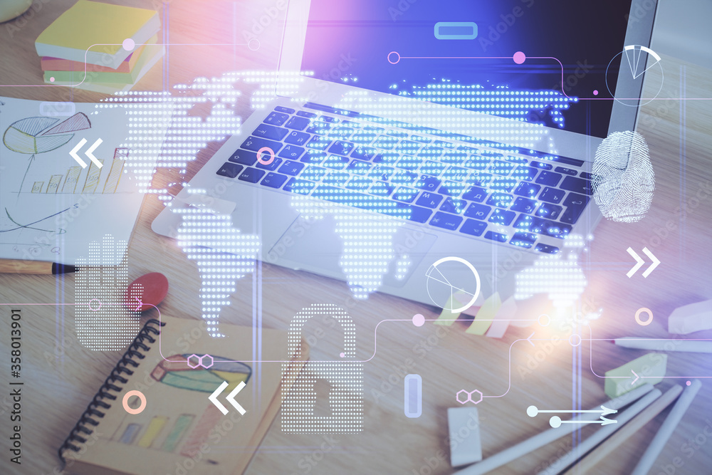 Obraz premium Multi exposure of table with computer and world map hologram. International data network concept.