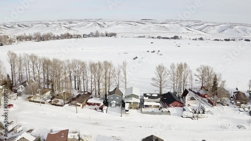 The Wonderful Location For Ice Fishing In Lac Pelletier Saskatchewan, Canada During Winter - Aerial Shot photo