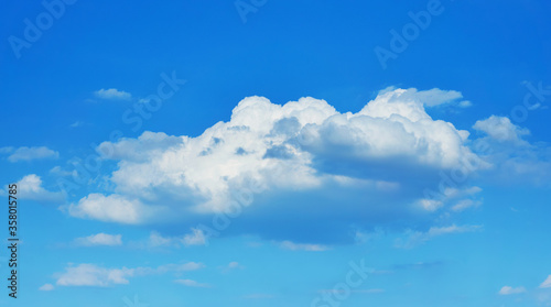 Big white cloud in the beautiful blue sky.