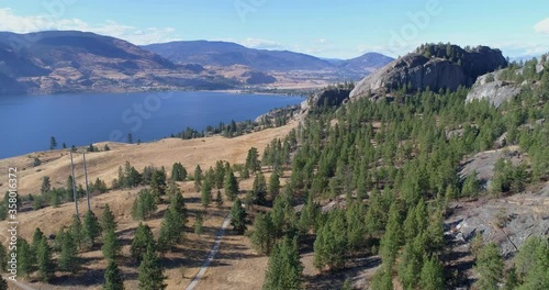 Aerial tracking shot along Skaha Lake British Columbia photo