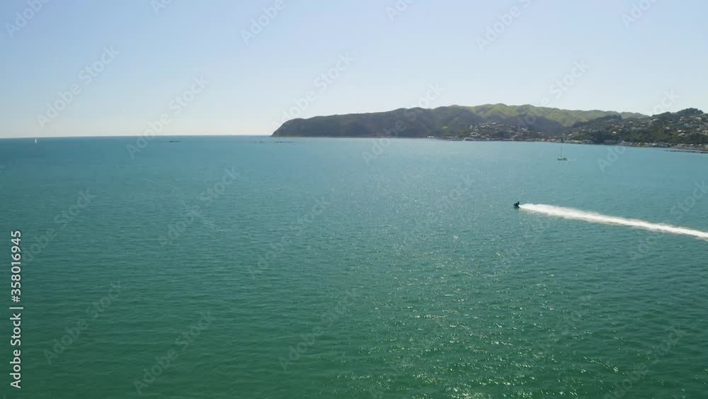 Drone shot of Jetski in the ocean Drone shot of Jetski in the ocean