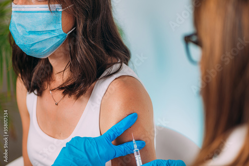 Woman Getting a Corona Virus Vaccine Trial