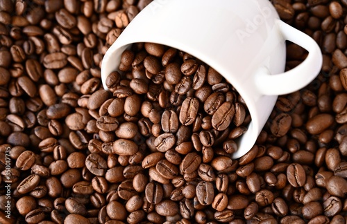 coffee beans and cup, natural coffee background.
