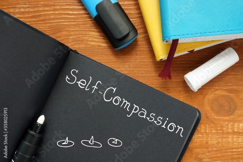 Motivation concept meaning Self-Compassion with inscription on the page. photo