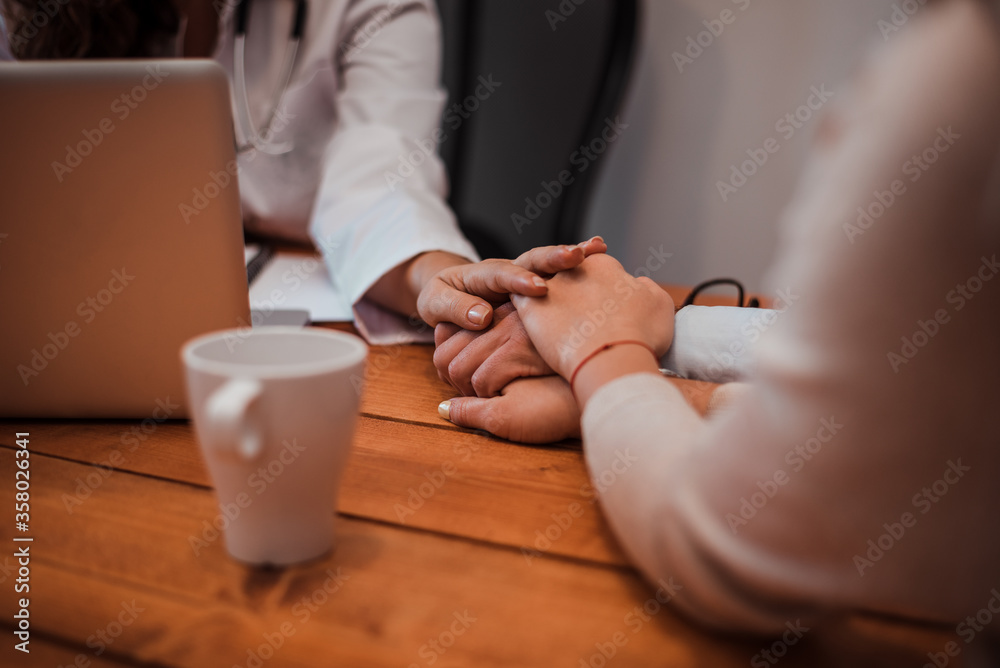 Close-up image of supporting hands of friendly general practitioner. Close-up image of supporting hands of friendly general practitioner.