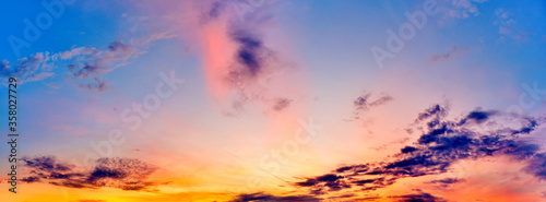 dusk sky landscape background at sunset natural color of evening cloudscape panorama with sun below horizon ultra wide panoramic view