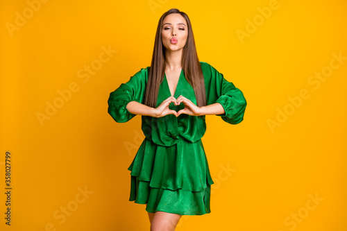Portrait of her she nice-looking attractive stunning sweet cheery straight-haired girl showing heart gesture sending air kiss isolated over bright vivid shine vibrant yellow color background