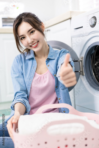 Asian woman wash clothes