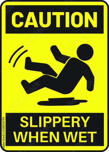 caution slippery when wet warning sign