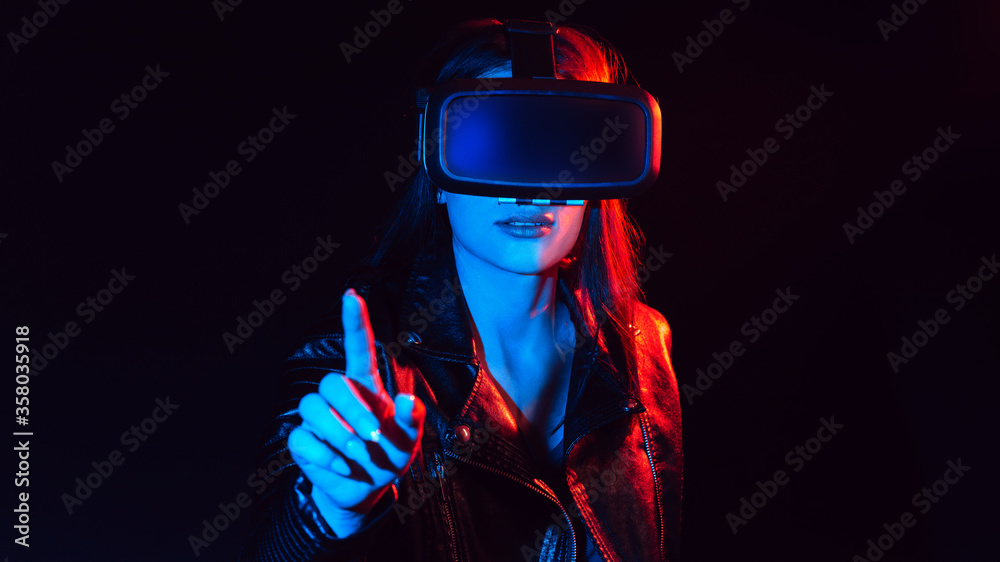 girl gets the experience of using virtual reality glasses girl gets the experience of using virtual reality glasses