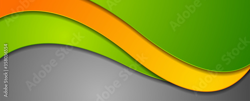Green and orange abstract elegant waves corporate vector background