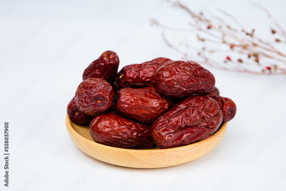 Dry red jujubes isolated on white background. Dry red jujubes isolated on white background.