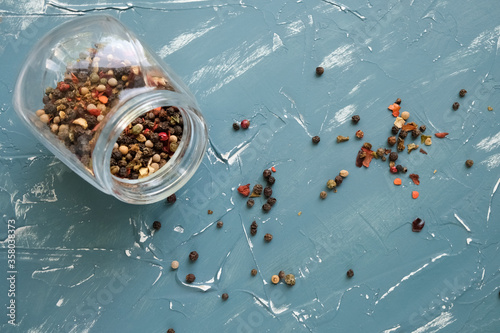 spices scattered on the table black pepper
