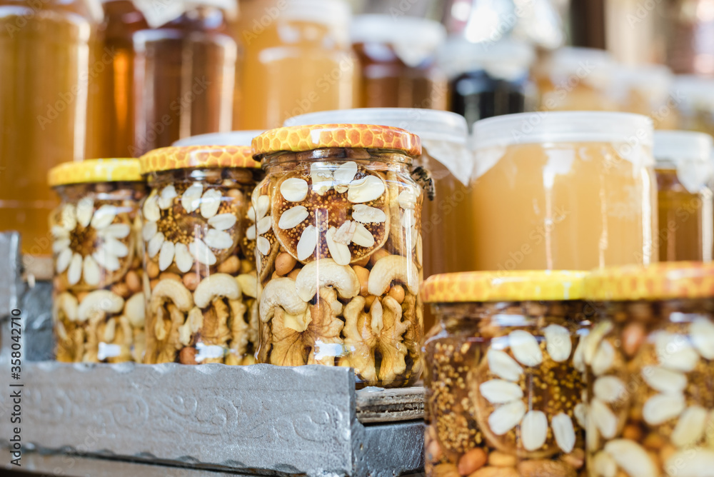 nuts with honey, jars of honey, nuts with honey