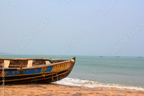 Wooden Fishing boat in a beach © suman