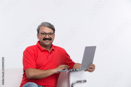 Photography Young man using laptop